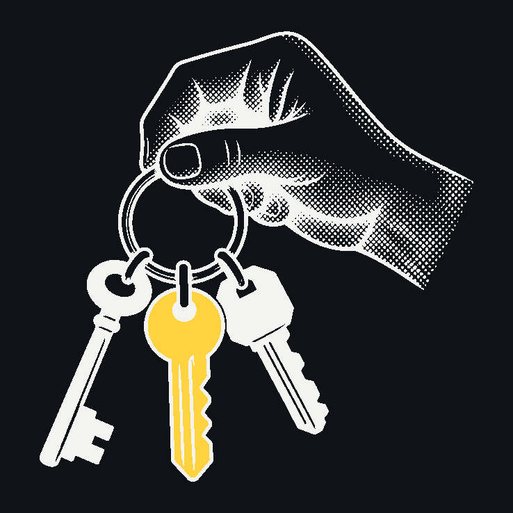 One hand holds a key ring with three different keys.